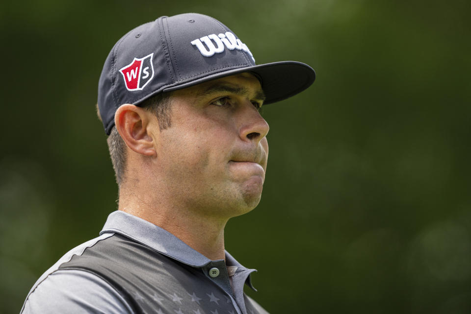 Gary Woodland looks down the fairway on the second hole during the third round of the Wells Fargo Championship golf tournament at Quail Hollow on Saturday, May 8, 2021, in Charlotte, N.C. (AP Photo/Jacob Kupferman)