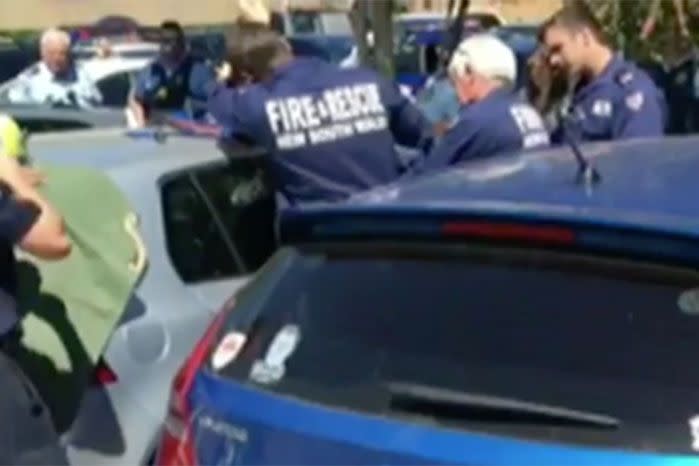 Fire crews and a locksmith rushed to rescue the little girl from the Volkswagen Golf. Photo: 7 News.