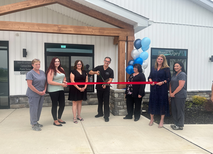 Dr. Jason Lichten cuts the ribbon at Central Ohio Plastic Surgery on June 6, 2023 in Lancaster. Central Ohio Plastic Surgery is located at 2656 N Columbus Street, Suite A