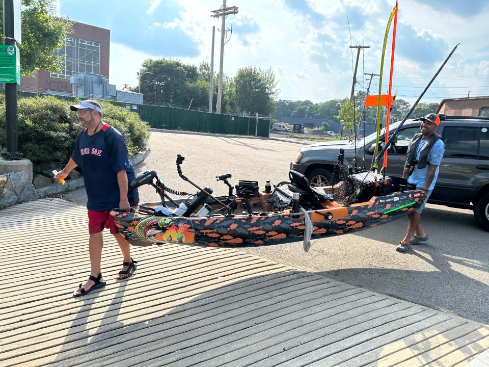 Middleboro resident Jesse Jimenez and Brockton resident Russell McAdams prepare to launch their boats in Weir Village at Weir Riverfront Park on Tuesday, Sept. 5, 2023.