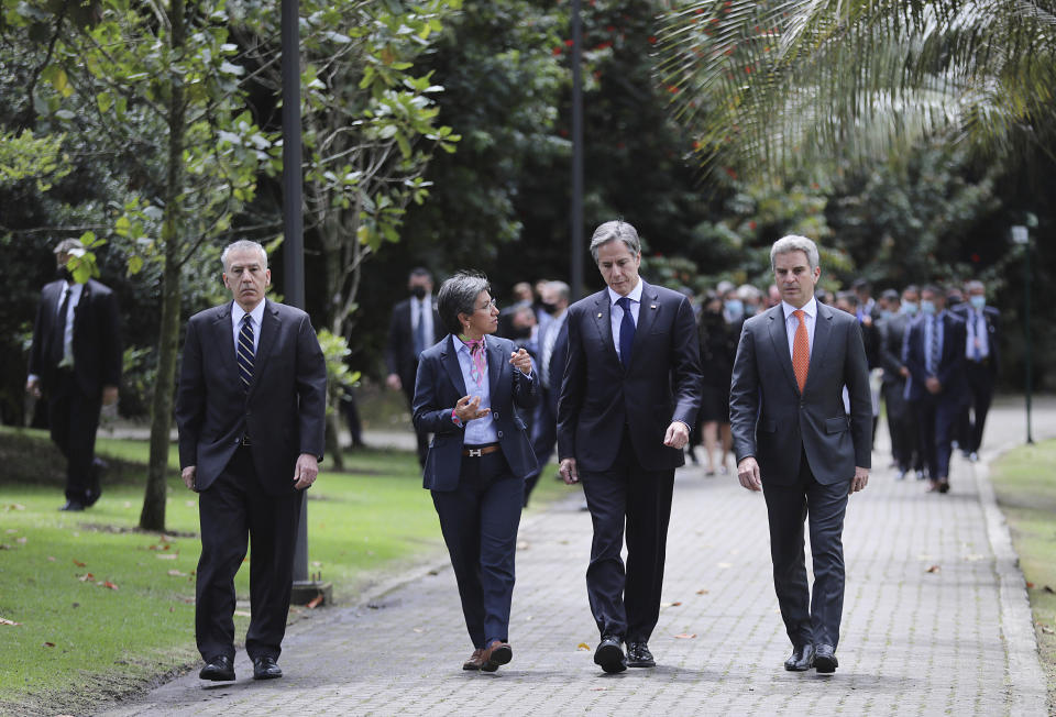 Secretary of State Antony Blinken visits the Jose Celestino Mutis botanical garden with U.S. Ambassador to Colombia Philip S. Goldberg, Mayor of Bogota Claudia Lopez and Colombian Minister of the Environment and Sustainable Development Carlos Eduardo Correa in Bogota, Colombia, Thursday, Oct. 21, 2021. (Luisa Gonzalez/Pool via AP)