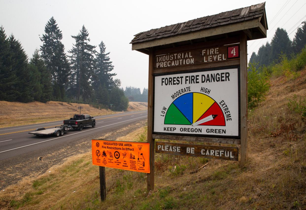A sign along Highway 58 near Pleasant Hill warns motorists of the extreme fire danger in Oregon.