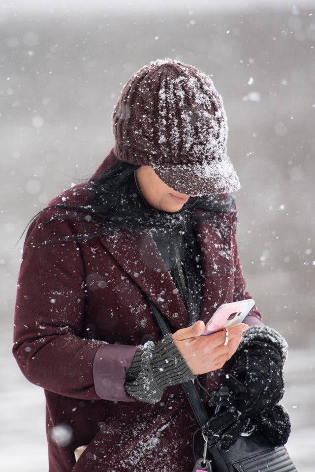 A man walks in the snow