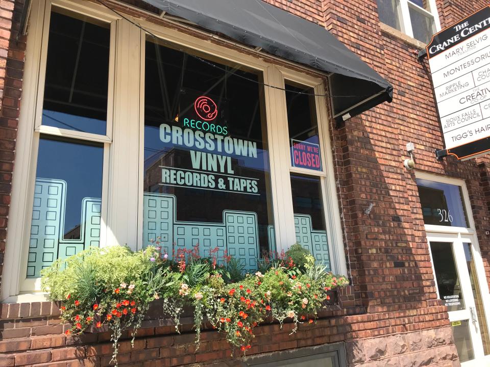 Crosstown Vinyl's storefront in the Crane Building at 326 E. 8th St.