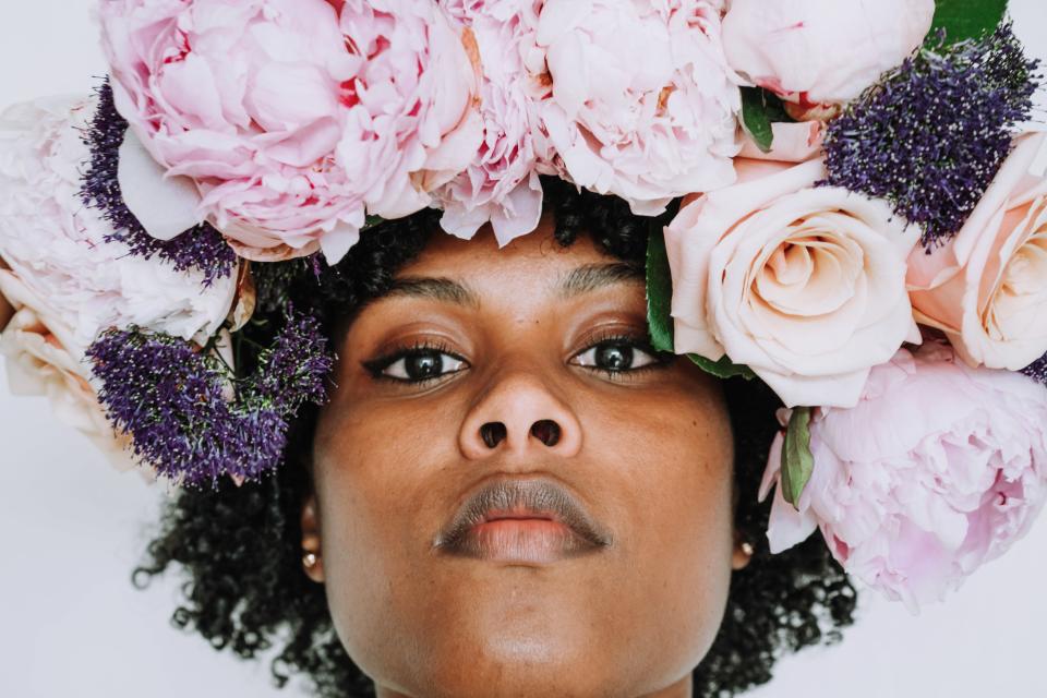 <h1 class="title">Black Woman With Afro And Flower Crown</h1><cite class="credit">Getty Images</cite>