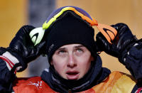 FILE - Mark McMorris looks at his score after his run during the men's slopestyle final at Phoenix Snow Park at the 2018 Winter Olympics in Pyeongchang, South Korea, Sunday, Feb. 11, 2018. Still bothering many of the riders was the way the slopestyle contests went down at the Pyeongchang Games four years ago. “It was a bloodbath out there,” said McMorris, the Canadian snowboard star who won a bronze medal in the men's slopestyle contest that also was held in windy, subpar conditions. (AP Photo/Lee Jin-man, File)