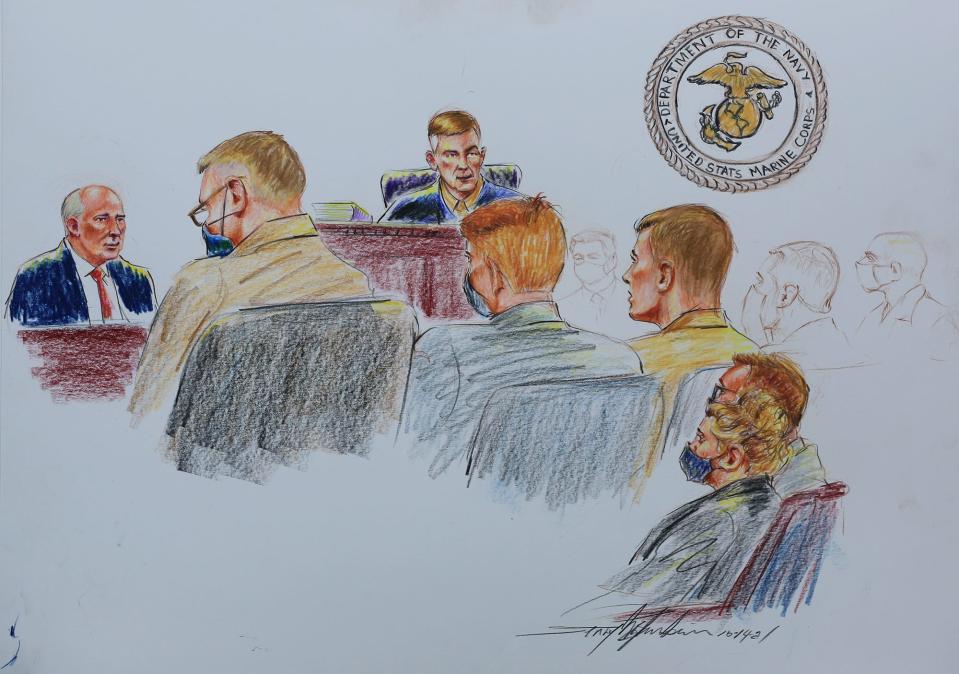 At left, U.S. Rep. Louie Gohmert of Texas testifies on behalf of Marine Lt. Col. Stuart Scheller, at right, during the sentencing phase of Scheller's court-martial on Oct. 14, 2021, at Camp Lejeune, NC. Scheller pleaded guilty to violating military law by publicly criticizing American military leadership for the tumultuous withdrawal from Afghanistan.