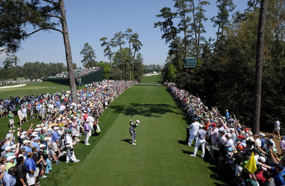 Tiger Woods tees off on the 18th hole during a practice round for the Masters golf tournament Wednesday, April 8, 2015, in Augusta, Ga. (AP Photo/David J. Phillip)