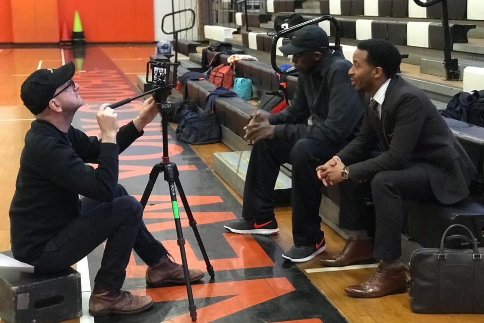 Steven Soderbergh directing Bill Duke and Andre Holland on the set of 'High Flying Bird' in 2019.