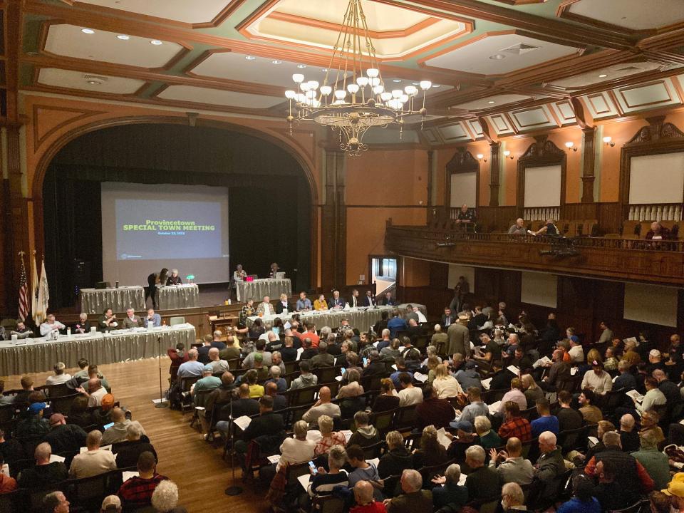 Provincetown community members were gathered Monday night at the town hall, shortly before the start of a special town meeting.