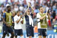 <p>Antoine Griezmann applauds to the French fans who stuck it out, as the 0-0 draw means France finished top of Group C </p>