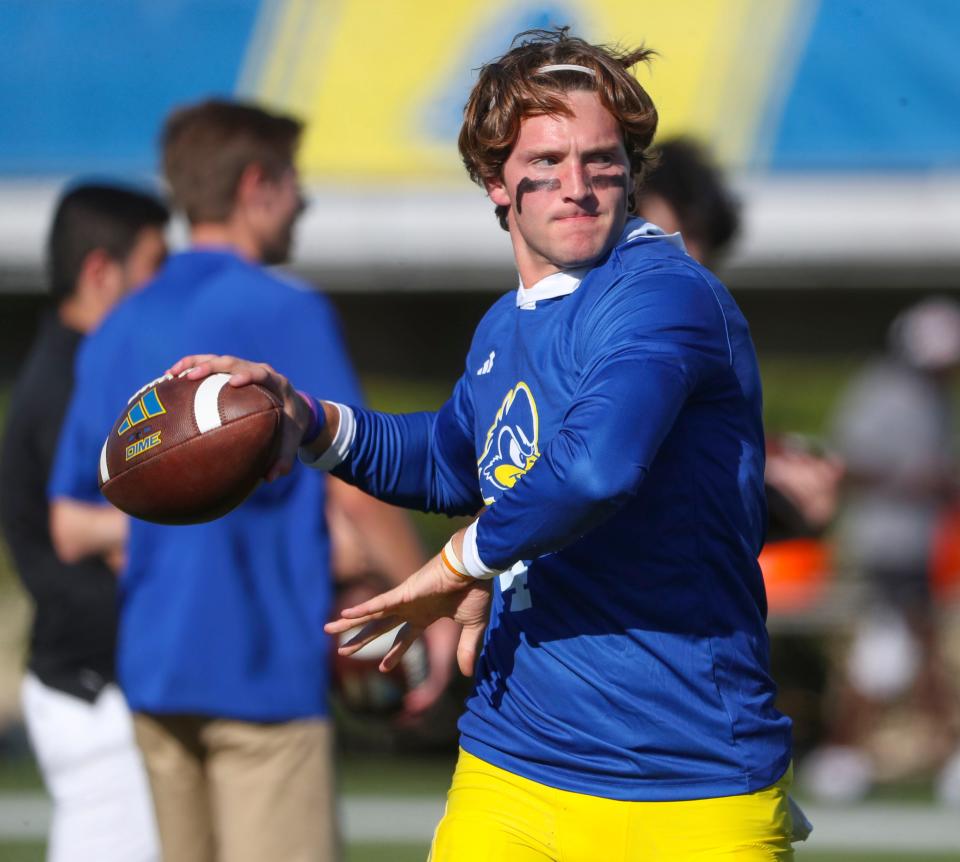 Delaware backup quarterback Nick Minicucci warms up before the Blue Hens take on St. Francis at Delaware Stadium, Saturday Sept. 16, 2023.