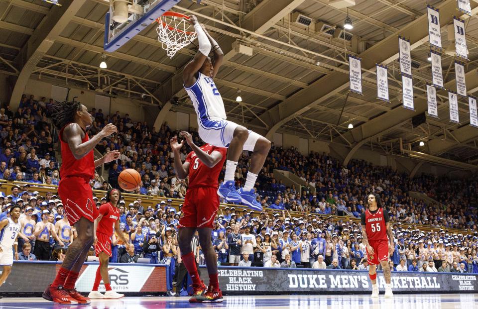 Duke's Mark Mitchell (25) dunks against Louisville during the second half of an NCAA college basketball game in Durham, N.C., Wednesday, Feb. 28, 2024. (AP Photo/Ben McKeown)