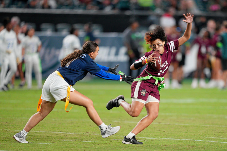 Girls play flag football during halftime of an Eagles preseason game back in August. (Andy Lewis/Icon Sportswire via Getty Images)