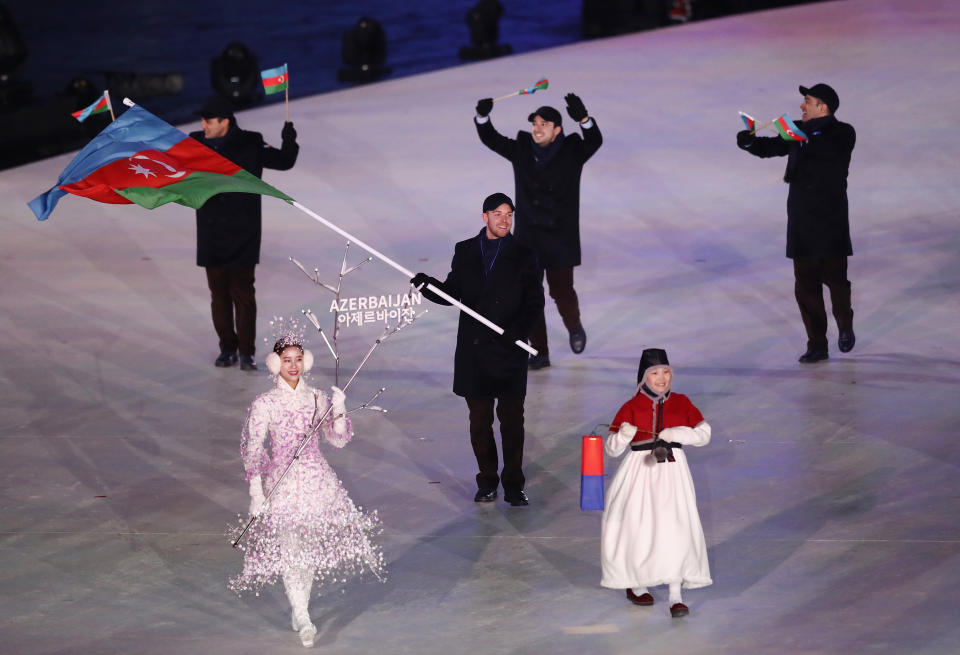 <p>Flag bearer Patrick Brachner of Azerbaijan leads the team during the Opening Ceremony of the PyeongChang 2018 Winter Olympic Games at PyeongChang Olympic Stadium on February 9, 2018 in Pyeongchang-gun, South Korea. (Photo by Ronald Martinez/Getty Images) </p>