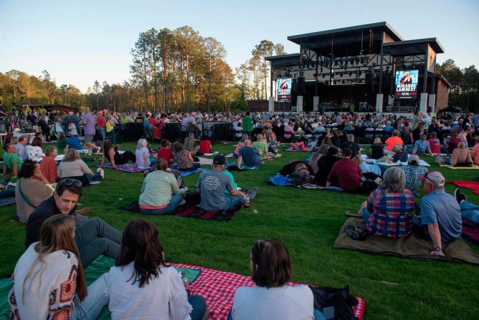 Fans relax on the lawn before the inaugural show at The Sound Amphitheater in Gautier on Friday, April 12, 2024. Hannah Ruhoff/Sun Herald