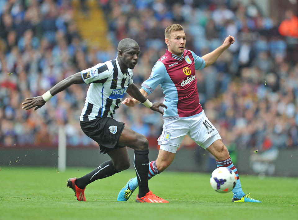 Newcastle United's Moussa Sissoko and Aston Villa's Andreas Weimann battle for the ball during the Barclays Premier League match at Villa Park, Birmingham.