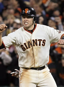 Buster Posey broke out with four hits in Game 4. (Justin Sullivan/Getty Images)