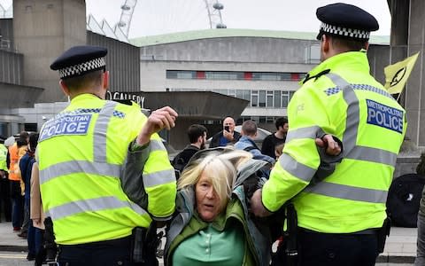 Activists have been forcibly removed from Waterloo Bridge - Credit: DANIEL LEAL-OLIVAS/AFP