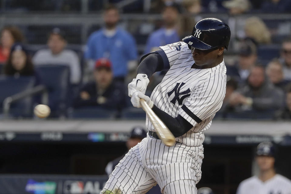 New York Yankees shortstop Didi Gregorius (18) connects for a grand slam home run against the Minnesota Twins during the third inning of Game 2 of an American League Division Series baseball game, Saturday, Oct. 5, 2019, in New York. (AP Photo/Frank Franklin II)