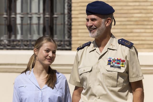 <p>Toni Galan/Getty Images</p> Princess Leonor and King Charles of Spain as she begins military training in August 2023