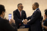 Tedros Adhanom Ghebreyesus, Director General of the World Health Organization (WHO) is congratulated by delegates after his reelection, during the 75th World Health Assembly at the European headquarters of the United Nations in Geneva, Switzerland, Tuesday, May 24, 2022. (Salvatore Di Nolfi/Keystone via AP)