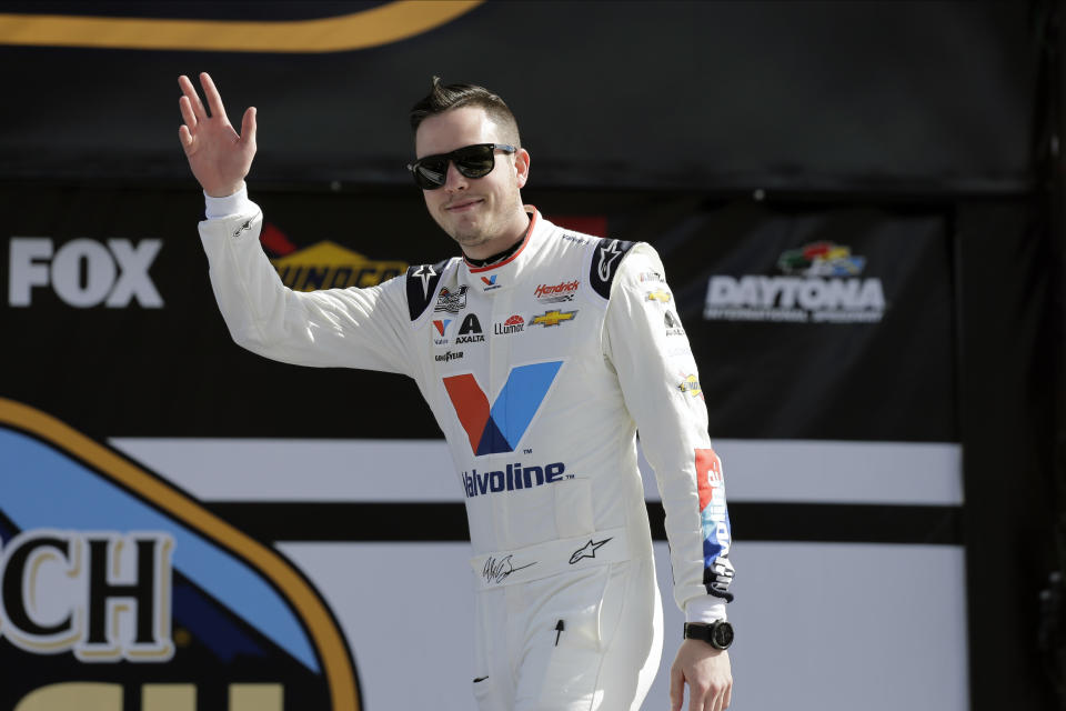 Alex Bowman waves to fans before the NASCAR Busch Clash auto race at Daytona International Speedway, Sunday, Feb. 9, 2020, in Daytona Beach, Fla. (AP Photo/Terry Renna)