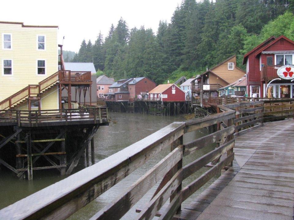 This August 2010 file photo shows a glimpse of Creek Street, a destination dotted with shops, galleries and restaurants, in Ketchikan, Alaska. This southeast Alaska town is now known more for tourism than its once-thriving timber industry. (AP Photo/Becky Bohrer)