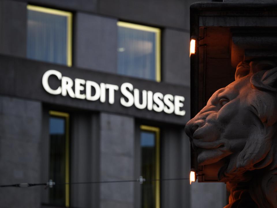 This photograph taken on November 4, 2020 shows a sign of Switzerland's second largest bank Credit Suisse on a branch's building in downtown Geneva.