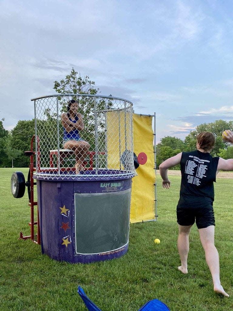 Members of the Perry Class of 2025 host a dunk tank during the Latino Festival on Aug. 26, 2023, at Pattee Park to raise funds for the 2024 prom.