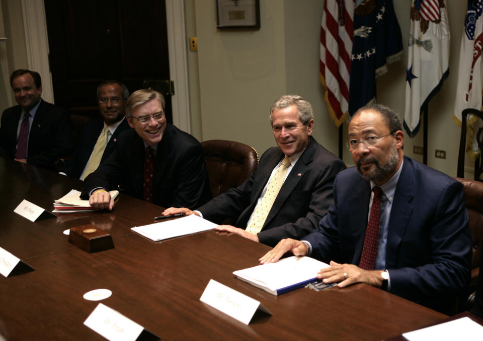 U.S. President George W. Bush meets with the President's Commission to Strengthen Social Security at the White House in Washington in Washington, Wednesday, Sept. 21, 2005. On the right is Dick Parsons, Chairman and CEO of Time Warner, Inc. Photo by Brooks Kraft/Corbis (Photo by Brooks Kraft LLC/Corbis via Getty Images)