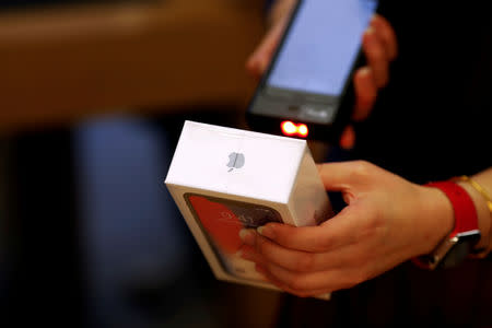 FILE PHOTO: A new iPhone X is sold at an Apple Store in Beijing, China November 3, 2017. REUTERS/Damir Sagolj/File Photo