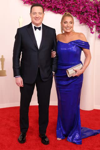 <p>John Shearer/WireImage</p> Brendan Fraser and Jeanne Moore at the 96th Annual Academy Awards