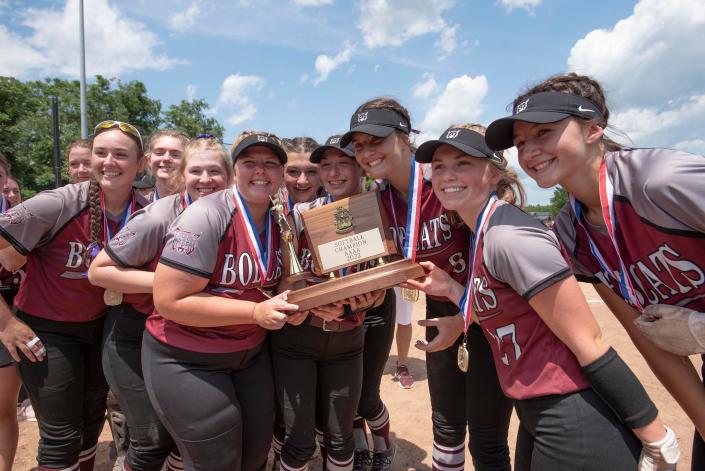 The Beaver Bobcats pose with the WPIAL Class 4A  championship trophy after defeating Elizabeth Forward, Friday, June 3 at California University.