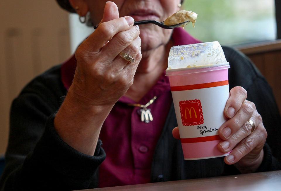 Barbara Cramer, 75, a McDonald's employee for 53 years, tastes the new limited-edition 'Grandma McFlurry' at the McDonald's restaurant at 615 North U.S.1, Fort Pierce, Monday, May 20, 2024. Cramer, the face of the new treat, began working at the McDonald's on South U.S. 1 in 1970 when she moved to St. Lucie County from New Jersey. She's worked at this McDonald's for the last 16 years. Throughout the years, she's worked as a crew member, trainer, manager and now as an administrative assistant. In her current position, she works part-time, seven days a week to keep herself busy. "I enjoy everything that I do," Cramer said tearfully. "My mom worked for McDonald's, my sister, my brother-in-law, my husband that passed away and my second husband who was the manager at the U.S. 1 store." The limited-edition sweet treat features vanilla ice cream, sweet syrup and crushed candy pieces reminiscent of candy a grandmother might have in her purse. The 'Grandma McFlurry' will hit stores on May 21 and remain on the menu while supplies last.