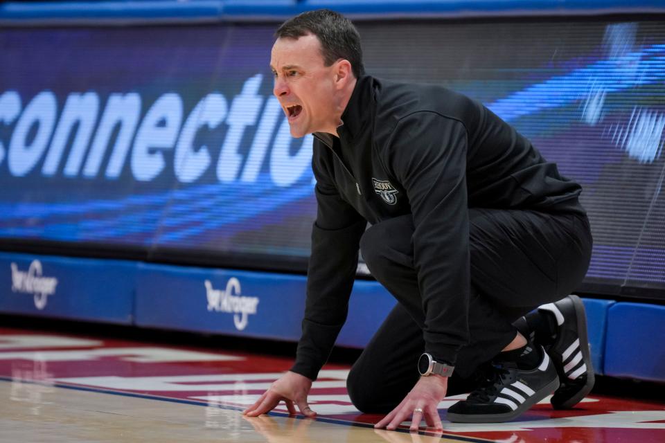 Rhode Island head coach Archie Miller shouts encouragement to his players during a game against Dayton in January.  The Rams have shown considerable progress this season but there's still lots of room for growth.