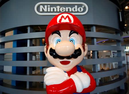 A figure depicting "Mario", a character in Nintendo's "Mario Bros." video games, is displayed at the company showroom in Tokyo, Japan July 14, 2016. REUTERS/Issei Kato/File Photo