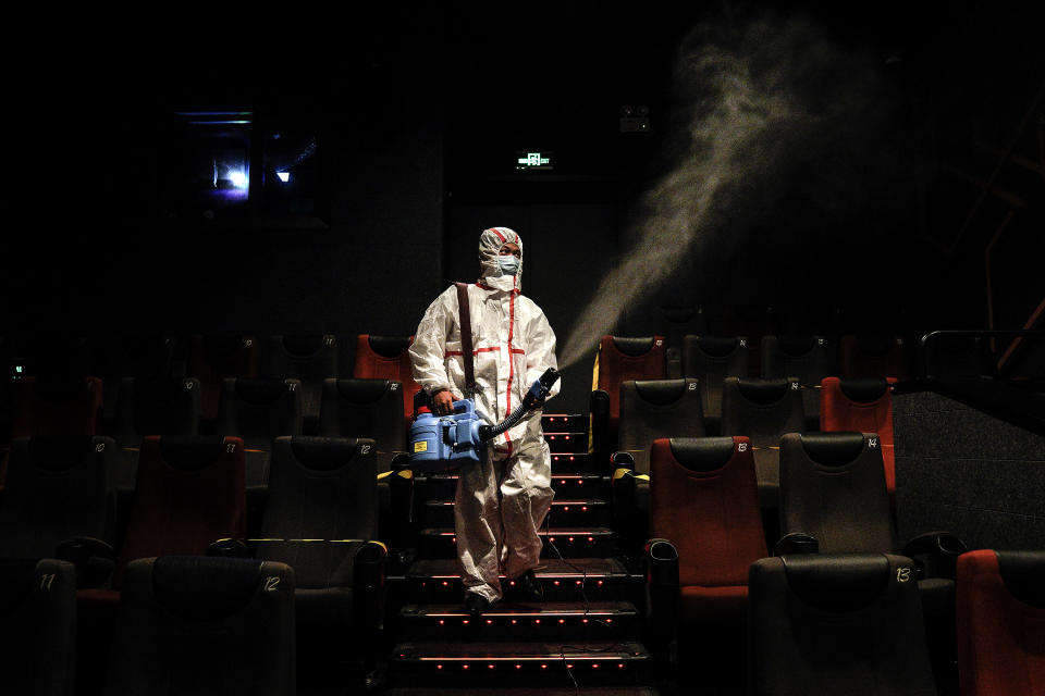 WUHAN, CHINA - JULY 20: (CHINA OUT)The employees wear the protective clothing disinfection in a cinema at Wuhan on July 20, 2020 in Wuhan ,Hubei Province,China.Taking various measures against COVID-19, cinemas in the city reopened in an orderly manner on Monday. The China Film Administration, in a circular last week, allowed cinemas in low-risk areas to resume operation with effective epidemic prevention measures in place. (Photo by Getty Images)