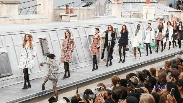 <em>Marie Benoliel climbs the runway to walk with the models during the finale of the Chanel Spring 2020 show. Photo: Victor Boyko/Getty Images</em>