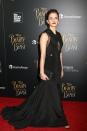 <p>Emma’s flowing black gown with sheer panels was the perfect amount of sophistication for New York’s Beauty And The Beast Premiere [Photo: PA] </p>