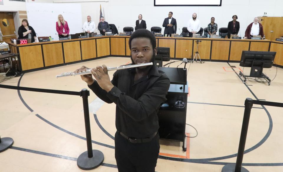 East Ramapo Marching band Grand Marshall Nick-Herson Orange plays The National Anthem during a meeting of the East Ramapo School Board at the district administration building in Spring Valley May 2, 2023.