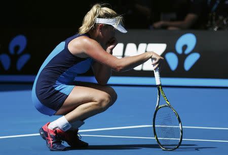 Tennis - Australian Open - Melbourne Park, Melbourne, Australia - 26/1/17 Coco Vandeweghe of the U.S. rests on her racket after losing a point during her Women's singles semi-final match against Venus Williams of the U.S. .REUTERS/Edgar Su