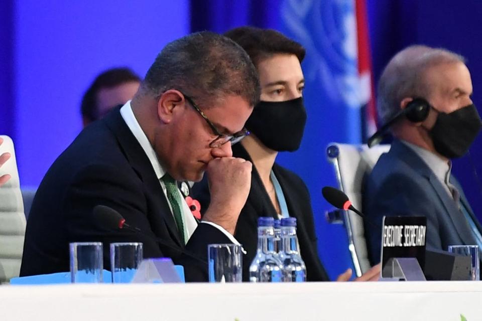 Britain's President for Cop26 Alok Sharma fighting back tears as he makes his concluding remarks during the COP26 UN Climate Change Conference in Glasgow on November 13, 2021 (AFP via Getty Images)