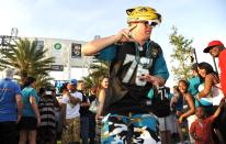 Jeremy Conn dances at the draft party wearing the jersey of Luke Joeckel the Jag's first pick in the 2013 draft. The Jacksonville Jaguars' 2014 NFL Draft Party was held at EverBank Field on Thursday May 8, 2014 Jacksonville, Florida. (AP Photo/Florida Times-Union/Bruce Lipsky)