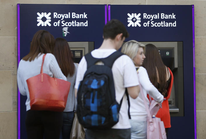 Cash machines outside a branch of the Royal Bank of Scotland in Glasgow after the news of the bank's proposal to register itself in England if Scotland votes for independence.