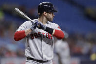 FILE - In this Sept. 23, 2019, file photo, Boston Red Sox's J.D. Martinez bats against the Tampa Bay Rays during the first inning of a baseball game in St. Petersburg, Fla. Many Red Sox players talked Saturday, Jan. 18, about how much they liked and valued manager Alex Cora and hated to see him go. “I’m heartbroken about it," Martinez said. “I understood his side of it. He definitely didn’t want to be a distraction. He was one of my favorite, if not my favorite, managers I’ve had." (AP Photo/Chris O'Meara, File)