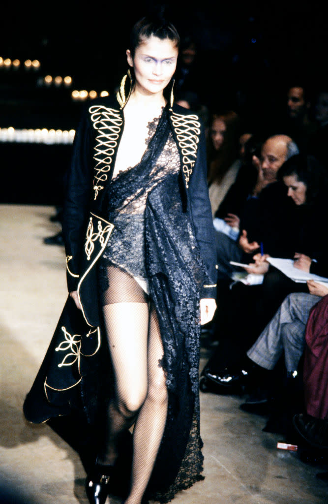 Helena Christensen walks in Alexander McQueen's fall 1996 fashion show.