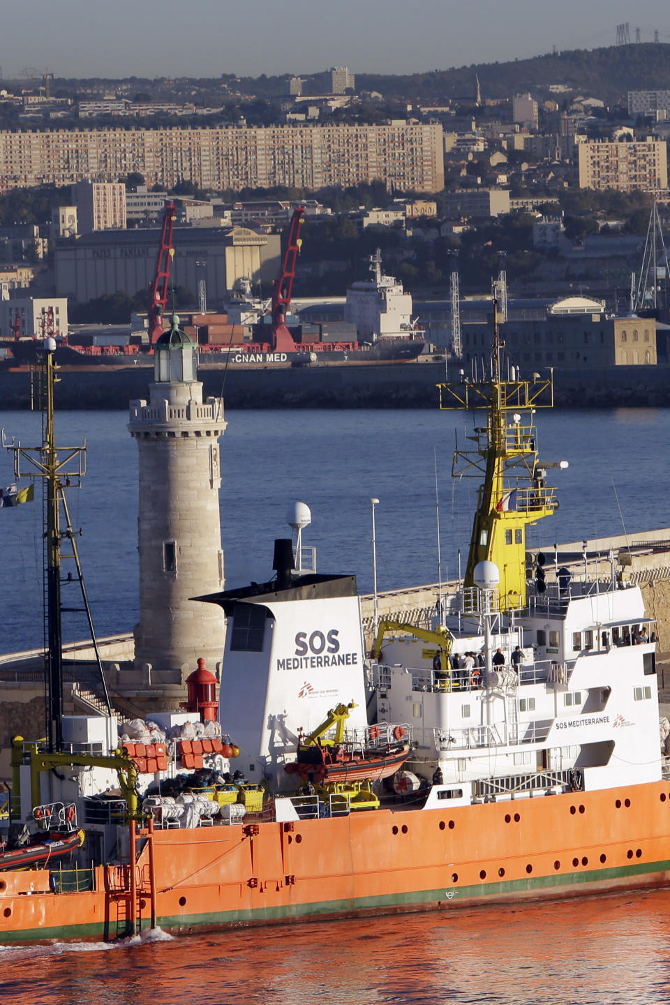 The Aquarius arrives at Marseille port, southern France, Thursday, Oct.4, 2018. Humanitarian group SOS Mediterranee said Thursday the Aquarius is making a stopover while waiting for a new flag and is "determined to go back to sea as soon as possible." The group urged European government to find a new flag for the vessel to secure its future after Panama's maritime authority removed the registration of the boat. (AP Photo/Claude Paris)