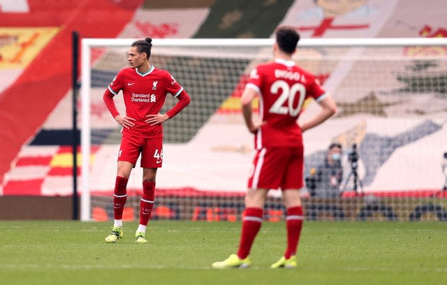 Liverpool players stand dejected