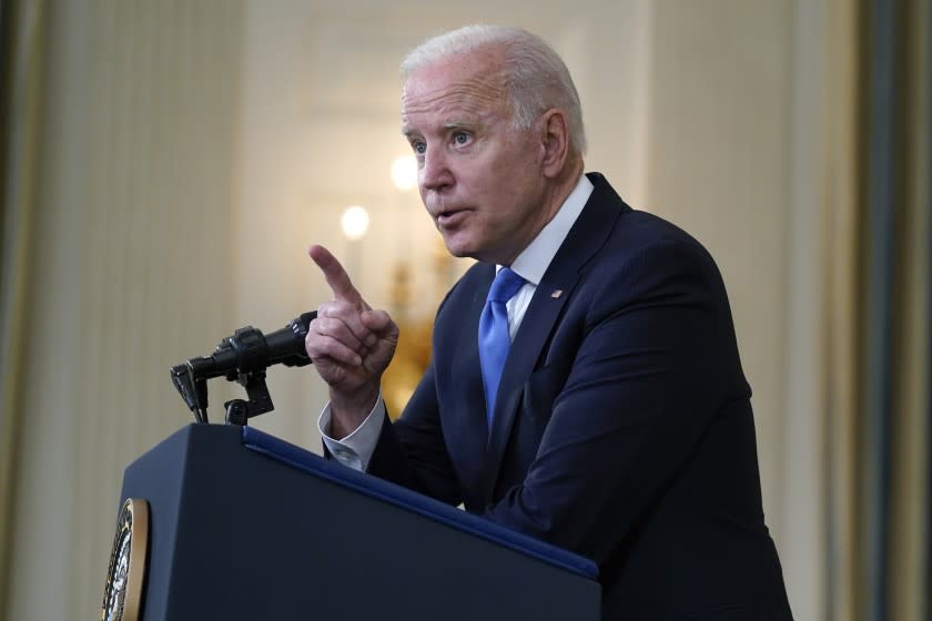 President Joe Biden takes questions from reporters as he speaks about the American Rescue Plan, in the State Dining Room of the White House, Wednesday, May 5, 2021, in Washington. (AP Photo/Evan Vucci)